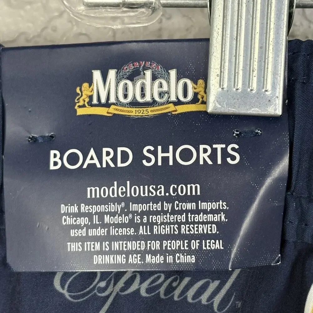 NWT Modelo Men's Board Shorts Swim Trunks Cerveza Beer Navy Blue Gold Size 2XL